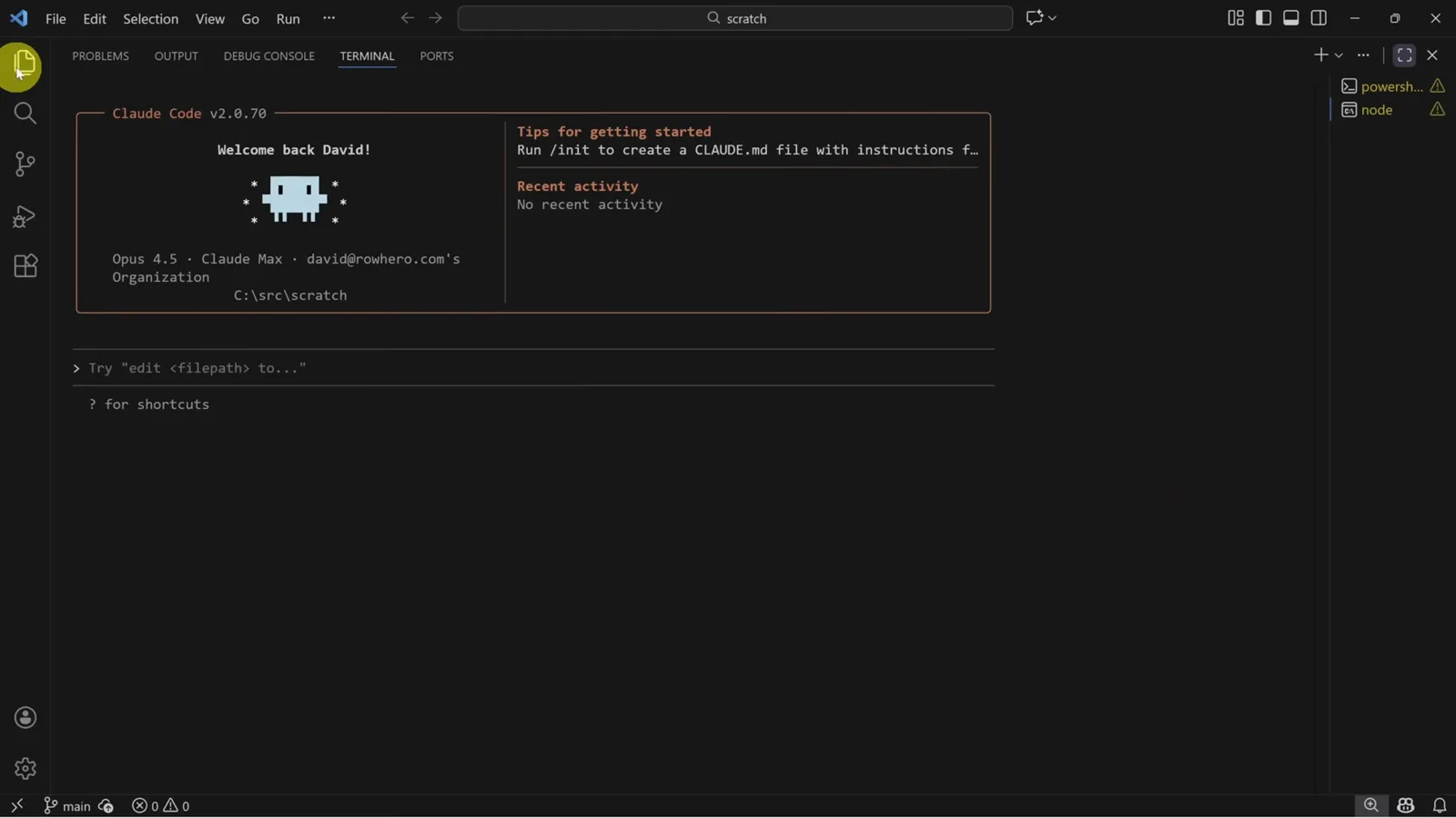 Claude Code v2 welcome box with the Tips for getting started panel running in the VS Code integrated terminal